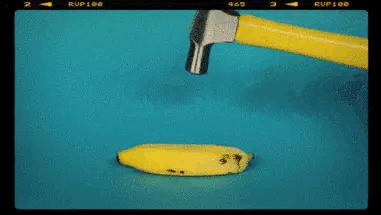 banana beat with hammer GIF
