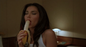 banana eating savoring yummy GIF