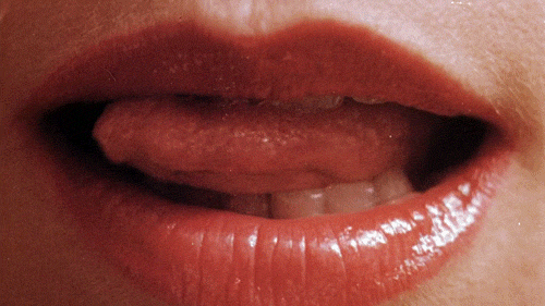 lick lips female red GIF